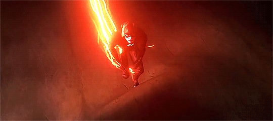Close-up of the Flash running, with streaks of light.